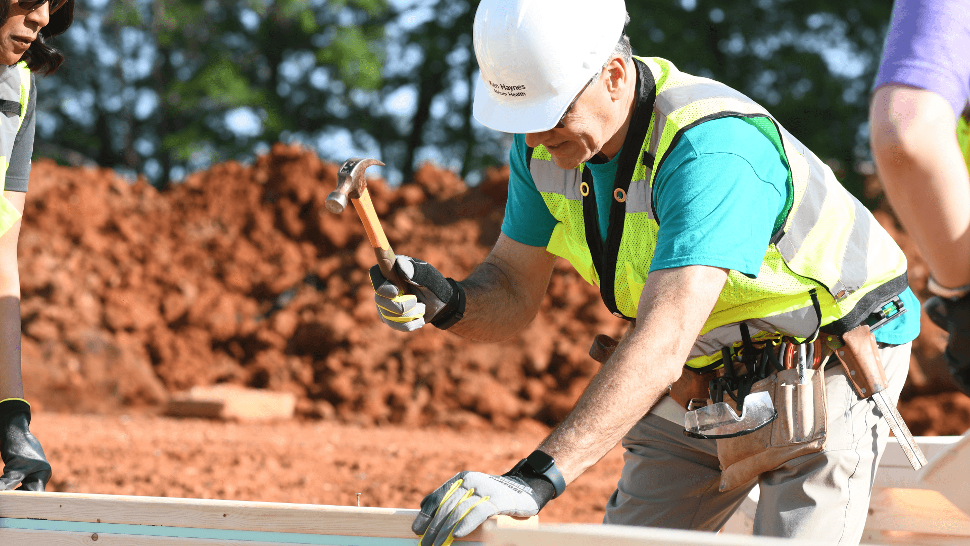 CEO Build volunteer on site