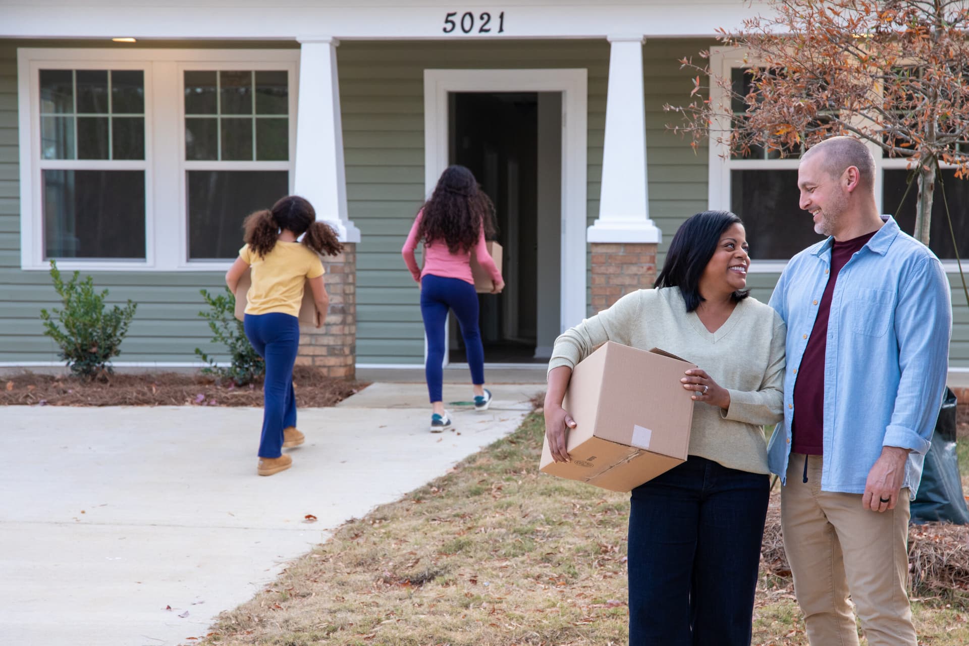 Family moving into their new home