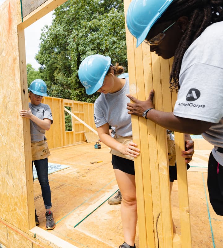 Habitat for Humanity volunteers building a home