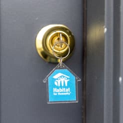 Lock and key with habitat for humanity branding