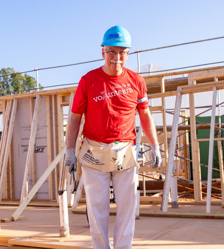 Habitat for Humanity volunteer building a home
