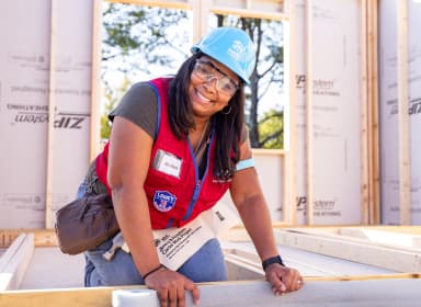 Habitat for Humanity volunteer building a new home