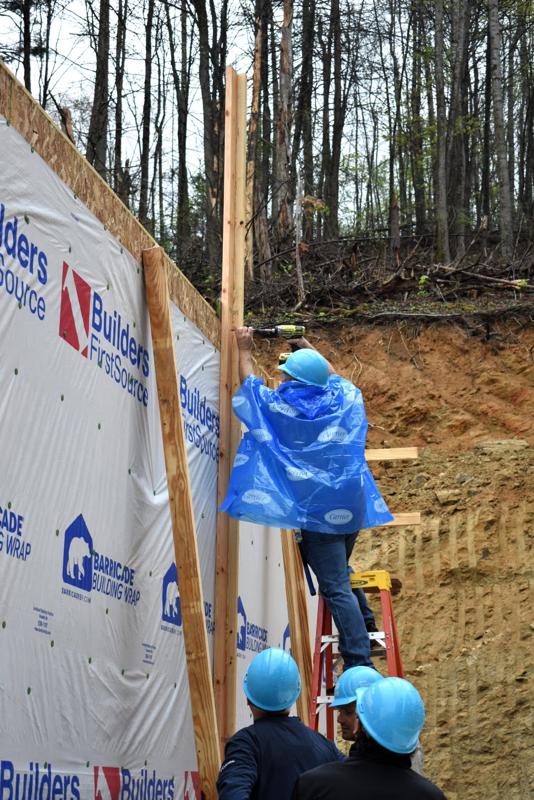 Habitat Charlotte Region volunteer at a new home construction site in Avery County
